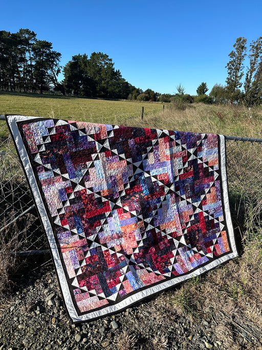 Pop in a Box - A colourful quilt made with 2½" strips